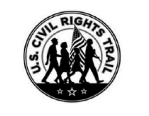 Applicant's mark with a four people, a flag design, and “U.S. Civil Rights Trail” across the top.