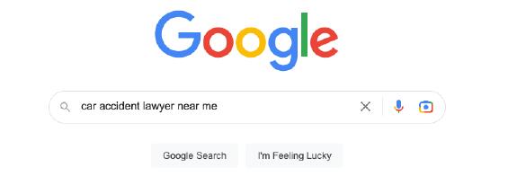 A screen-captured photo of the Google search bar with the multi-colored Google logo above. The text in the search bar reads: 